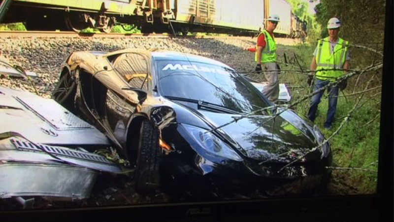 Illustration for article titled A Truck Carrying A McLaren 12C Was Just Destroyed By A Train